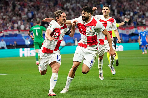 Luka Modric celebrates after scoring Croatia's opening goal